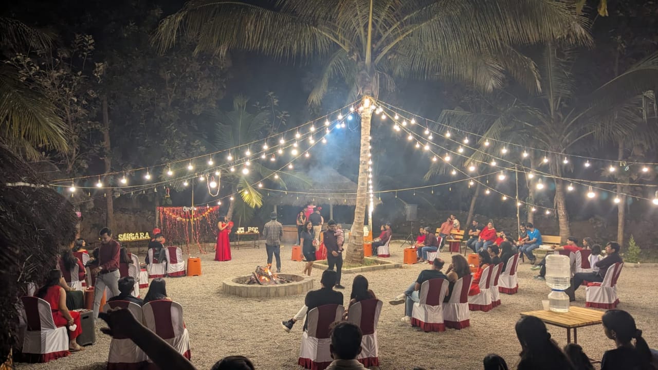 Tent stay setup in a natural outdoor setting at Vrindavana Stays